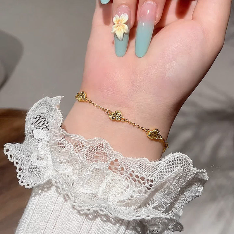 Klassisk Guld Armbånd med tidløs elegance