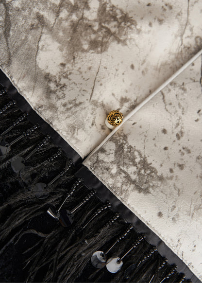 Well Tailored Garment with a Graceful Silhouette