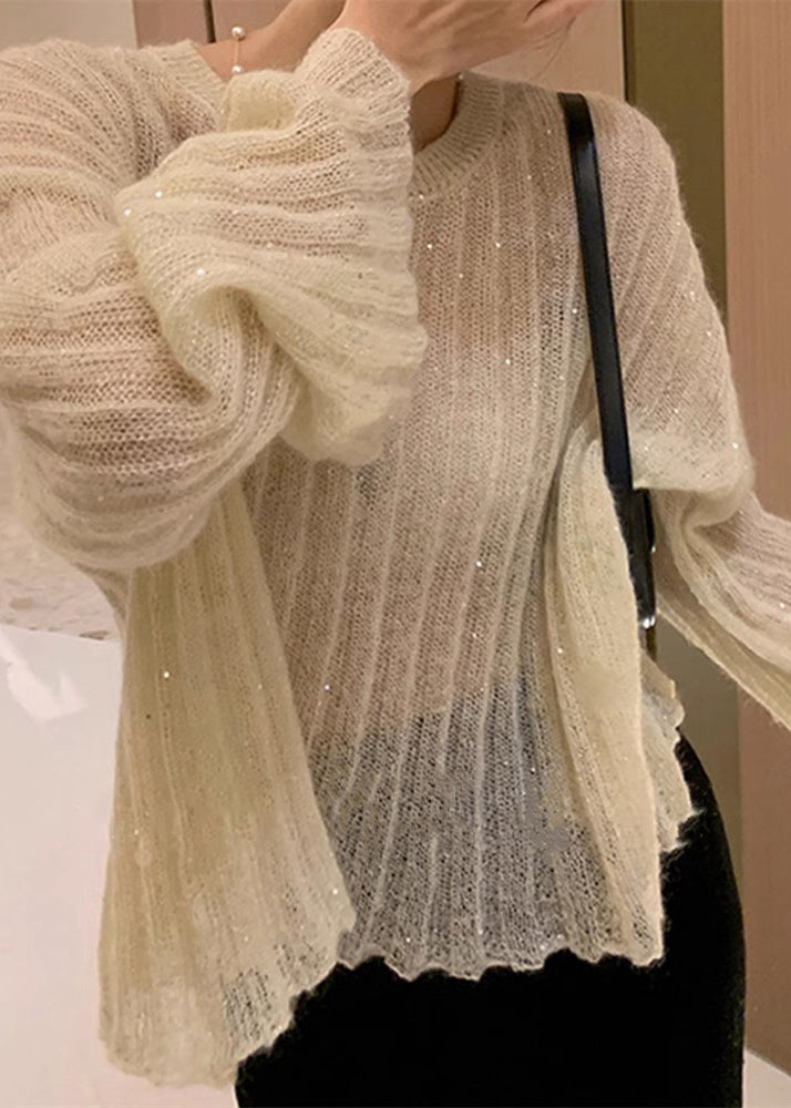 A Vintage Style Sweater with Delicate Timeless Details