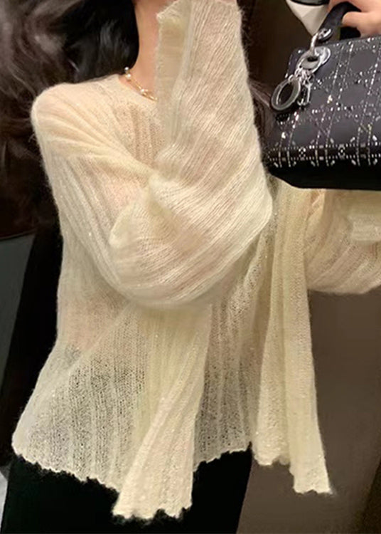 A Vintage Style Sweater with Delicate Timeless Details