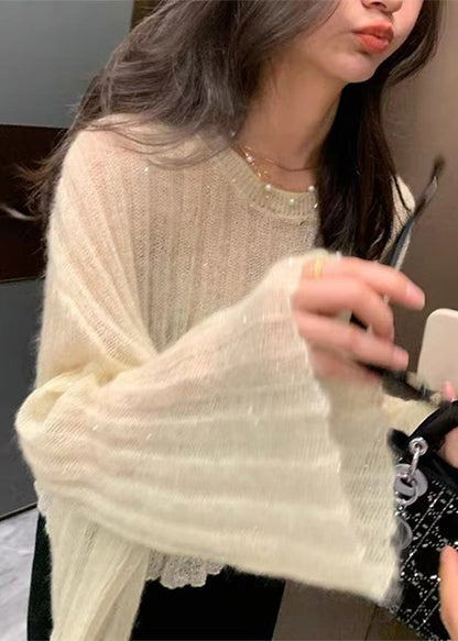 A Vintage Style Sweater with Delicate Timeless Details