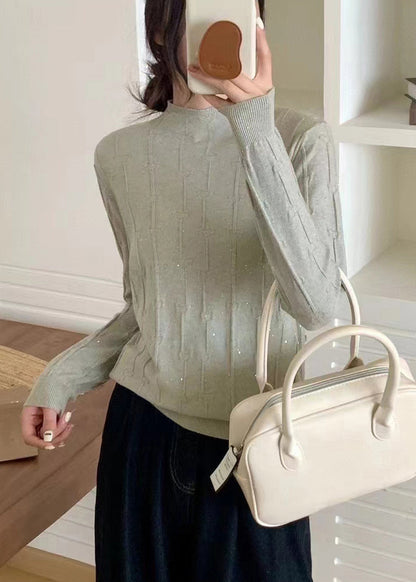 A Vintage Style Sweater with Delicate Timeless Details