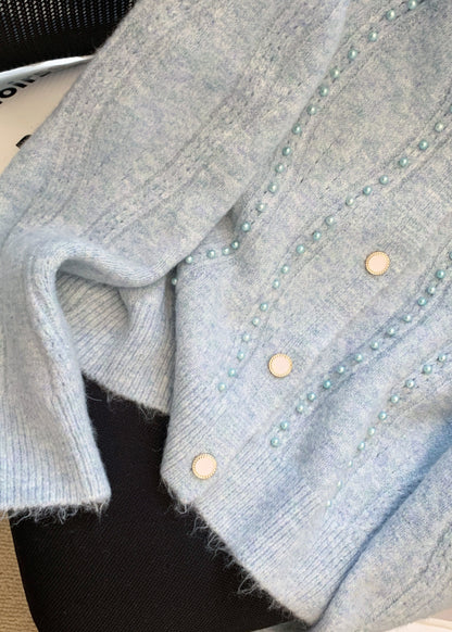 A Vintage Style Sweater with Delicate Timeless Details