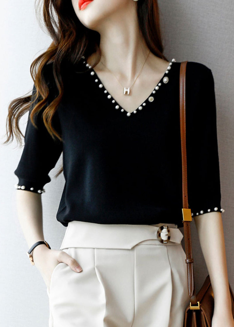 A Vintage Style Sweater with Delicate Timeless Details