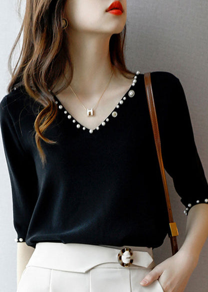 A Vintage Style Sweater with Delicate Timeless Details
