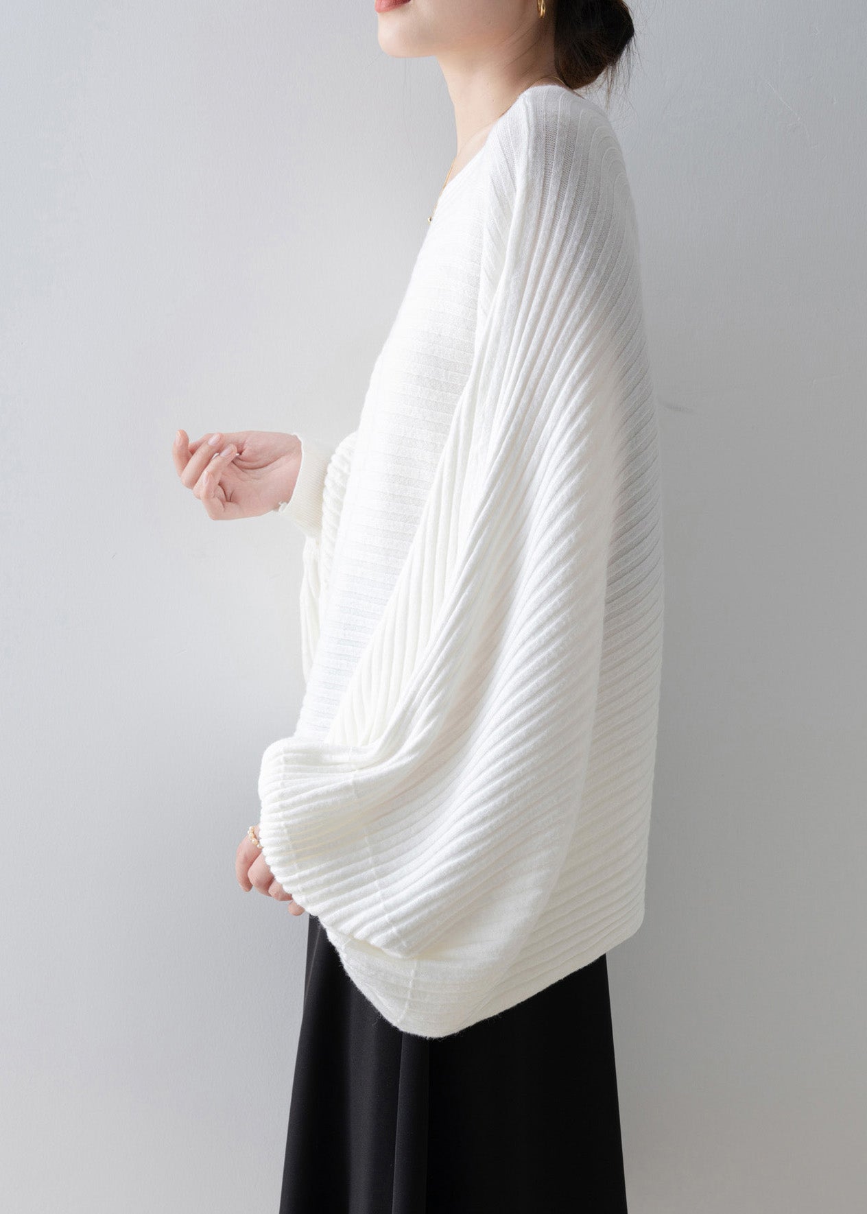 A Vintage Style Sweater with Delicate Timeless Details