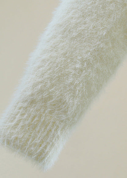 A Vintage Style Sweater with Delicate Timeless Details