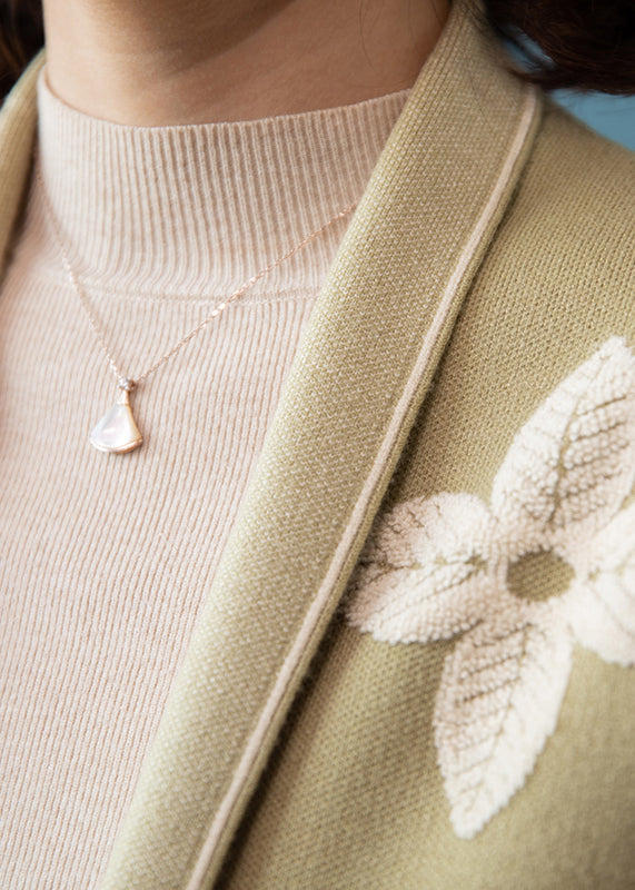 A Vintage Style Cardigan with Delicate Timeless Details