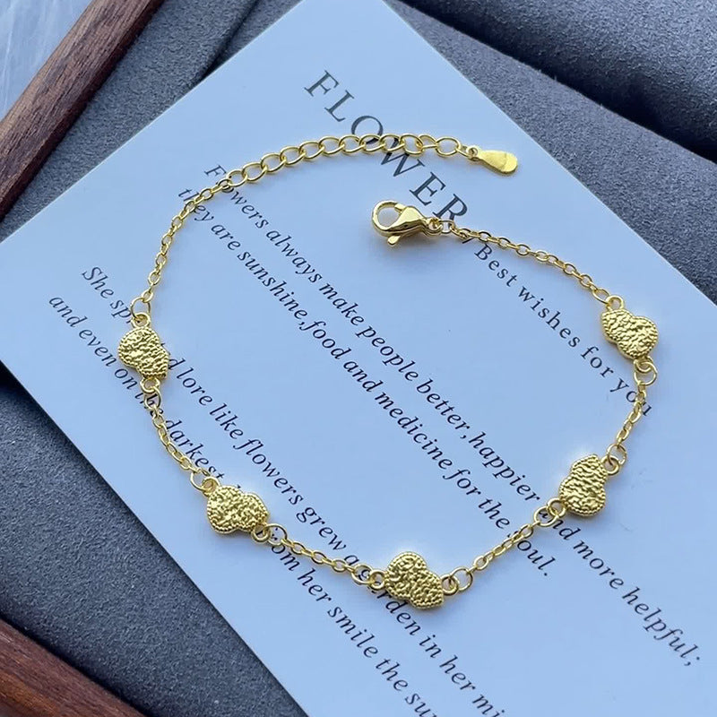 Klassisk Guld Armbånd med tidløs elegance