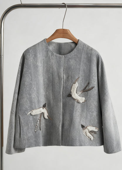 A Vintage Style Coat with Delicate Timeless Details