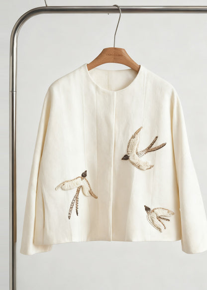 A Vintage Style Coat with Delicate Timeless Details