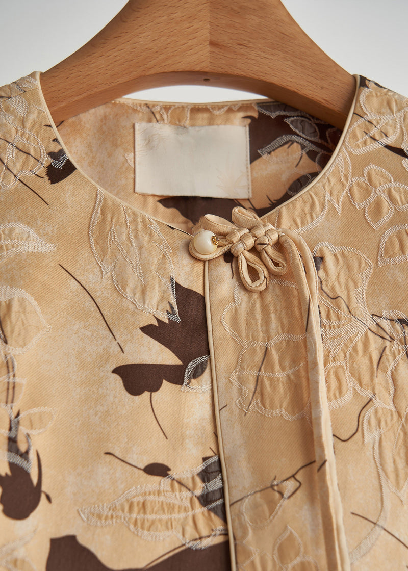 A Vintage Style Coat with Delicate Timeless Details