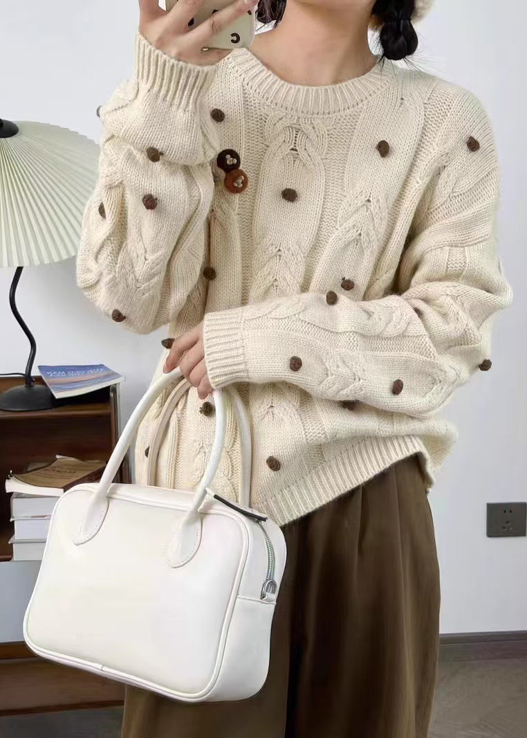 A Vintage Style Sweater with Delicate Timeless Details