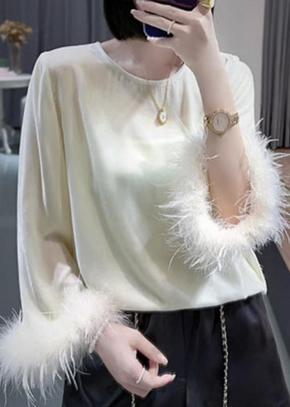 Well Tailored Top with a Graceful Silhouette