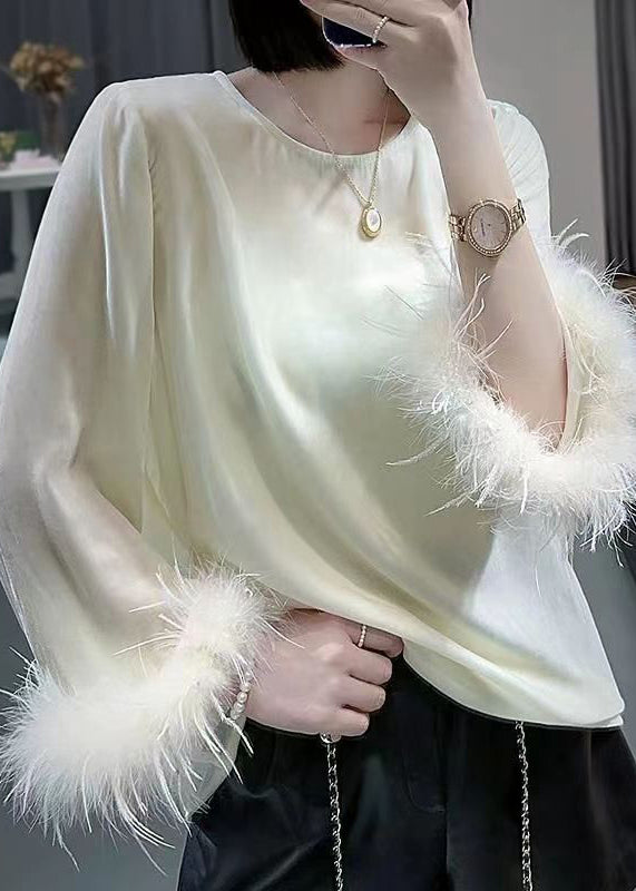 Well Tailored Top with a Graceful Silhouette