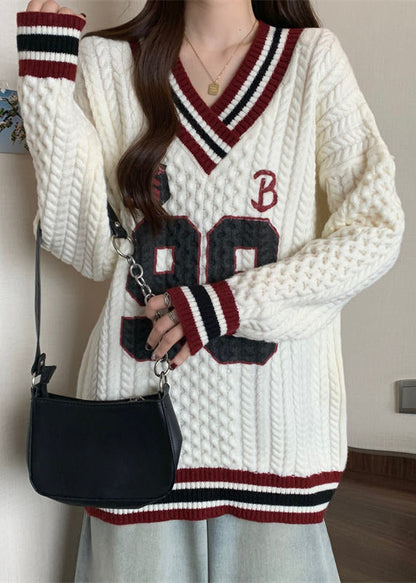 A Vintage Style Sweater with Delicate Timeless Details