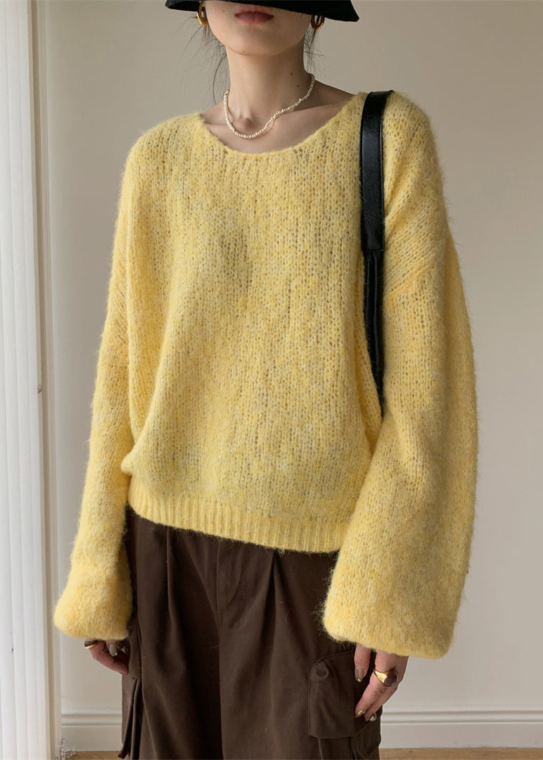 A Vintage Style Sweater with Delicate Timeless Details